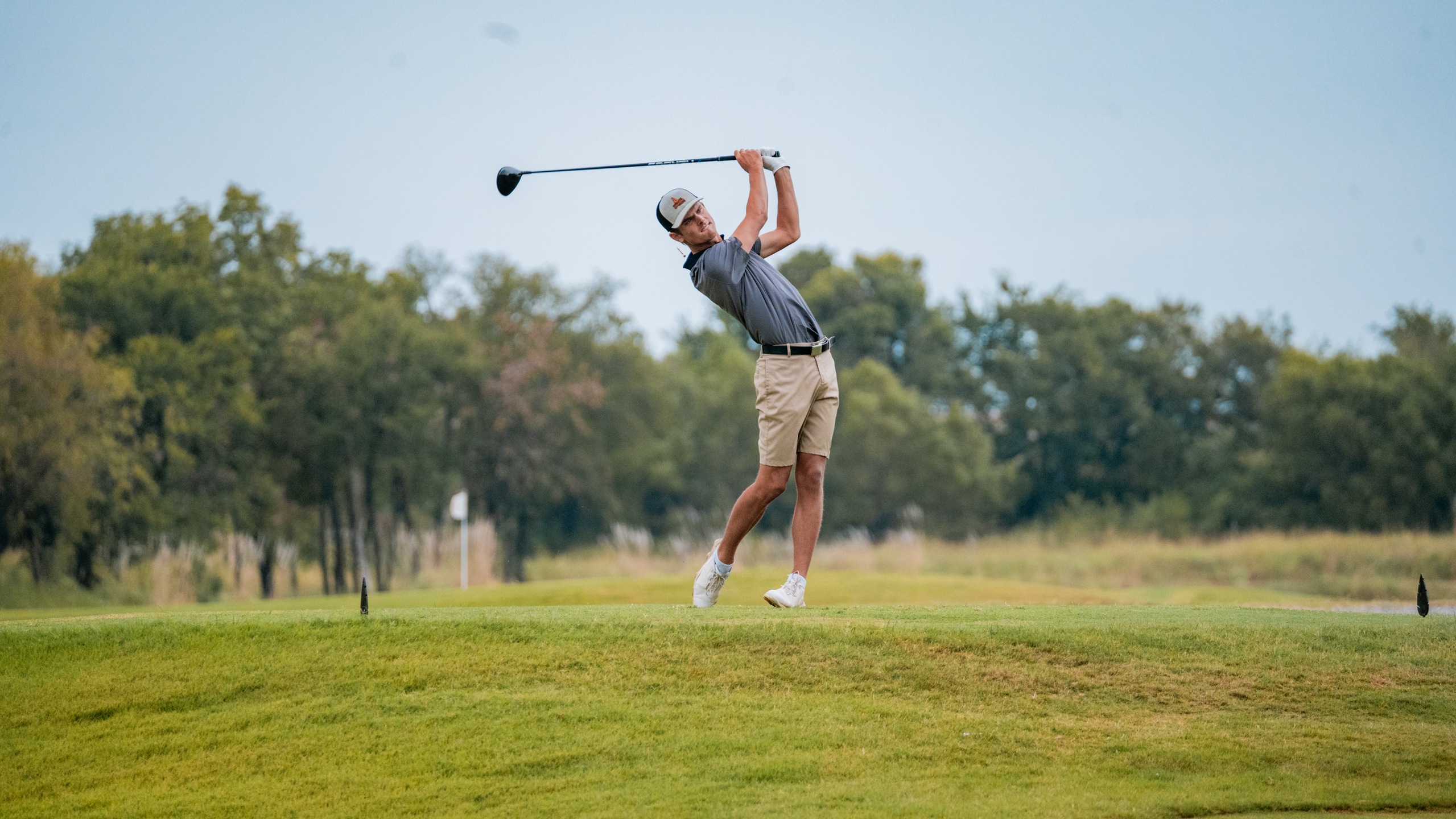 caleb smith drives his tee shot